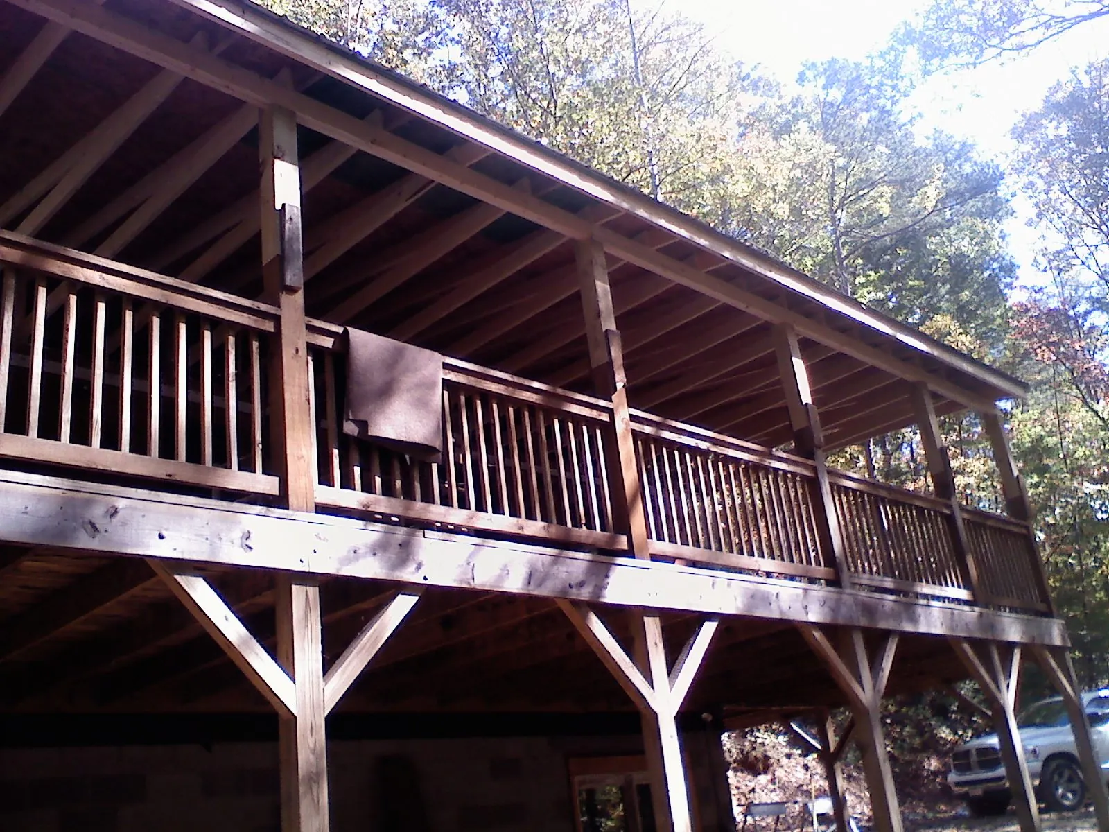 Timber framing under a new elevated porch and deck — Roof Leak Repair in Brentwood by Roofing Brothers
